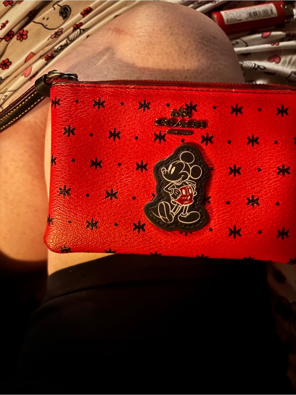 COACH Red Leather Mickey Mouse Wristlet with Star Print.